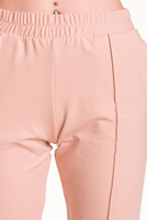 Dámské tepláky s okrajem pudrově růžové